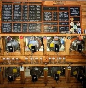 Casks on the stillage behind the pine bar, under the beer boards